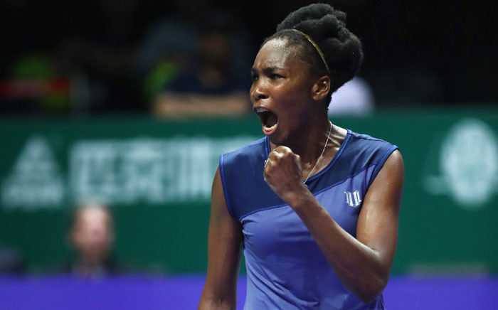 Venus Williams celebrates during her group stage match with Latvia’s Jelena Ostapenko. Picture: @WTA/Twitter.