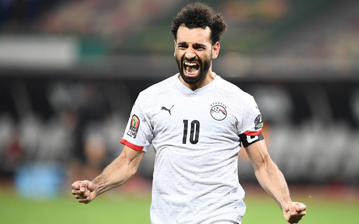 Egypt's forward Mohamed Salah celebrates after winning the Africa Cup of Nations (CAN) 2021 round of 16 football match between Ivory Coast and Egypt at Stade de Japoma in Douala on 26 January 2022. Picture: CHARLY TRIBALLEAU/AFP