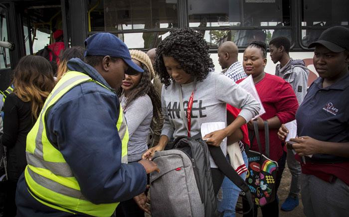 A TUT student is searched by security. Picture: Thomas Holder/EWN