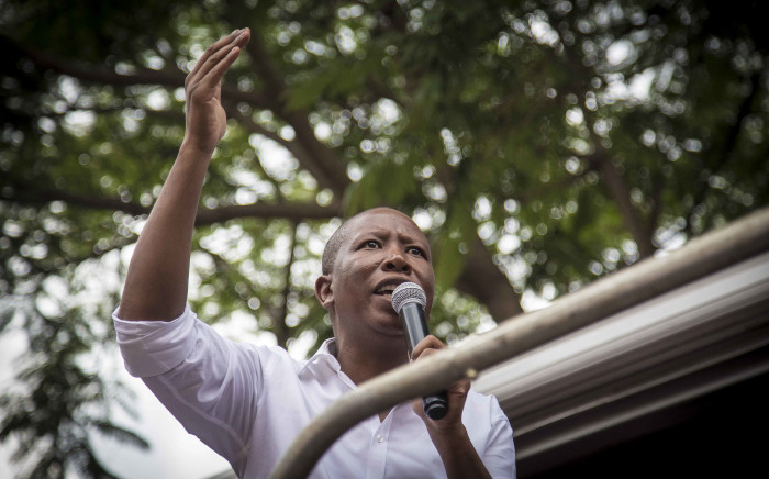 FILE: Julius Malema addresses EFF supporters outside the Pretoria High Court during President Jacob Zuma’s bid to interdict the release of the State Capture report. Picture: Thomas Holder/EWN.
