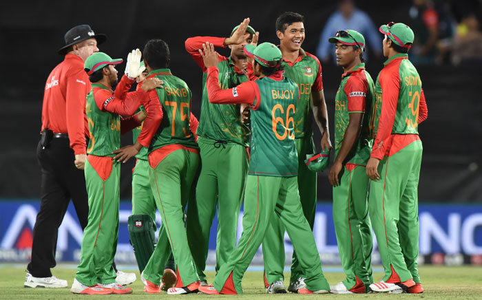 FILE: Bangladeshi players celebrate beating Afghanistan in the pool A 2015 Cricket World Cup match between Afghanistan and Bangladesh in Canberra on February 18, 2015. Picture: AFP.