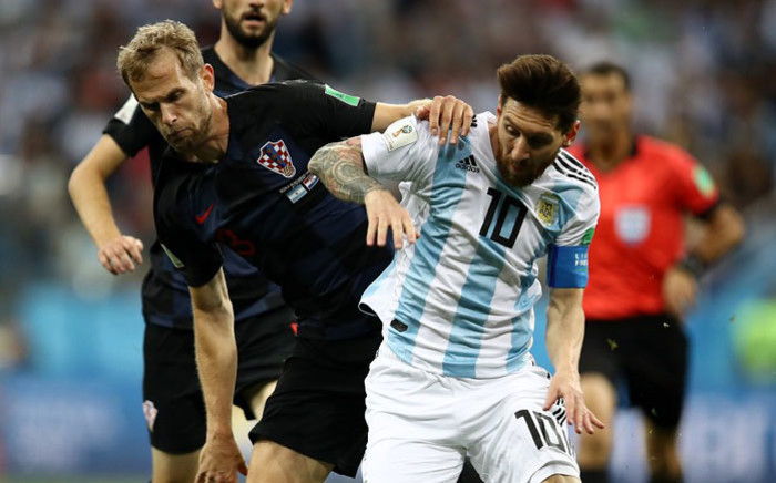 Argentina's Lionel Messi (right) tries to lose his Croatian opponent during their 2018 World Cup match on 21 June 2018. Picture: @Argentina/Twitter