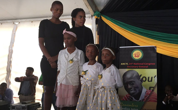 Sindiso Magaqa's children on stage. Magaqa'a niece Yolokazi spoke on behalf of the children. Picture: Ziyanda Ngcobo/EWN.
