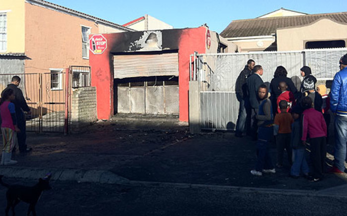 A garage which is used as a spaza shop by Somalis in Beacon Valley was destroyed on 10 July 2012. Picture: Malungelo Booi/EWN
