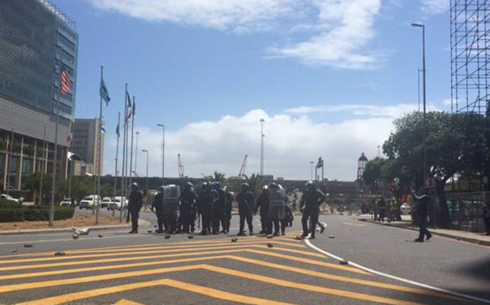 FILE: Cape Town police monitor the situation as asylum seekers protest outside Home Affairs building on 27 November 2014. Picture: Anja Knoblauch @Anja_Knoblauch  