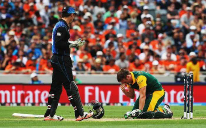 South African captain AB de Villiers falls to his knees after New Zealand beat the Proteas in the 2015 ICC Cricket World Cup semifinals at Eden Park, Auckland on 24 March 2015. Picture: CSA.