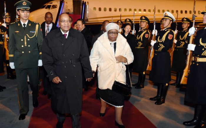 President Jacob Zuma and his wife Sizakele arrive at Beijing Capital Airport in the People's Republic of China. Picture: GCIS.