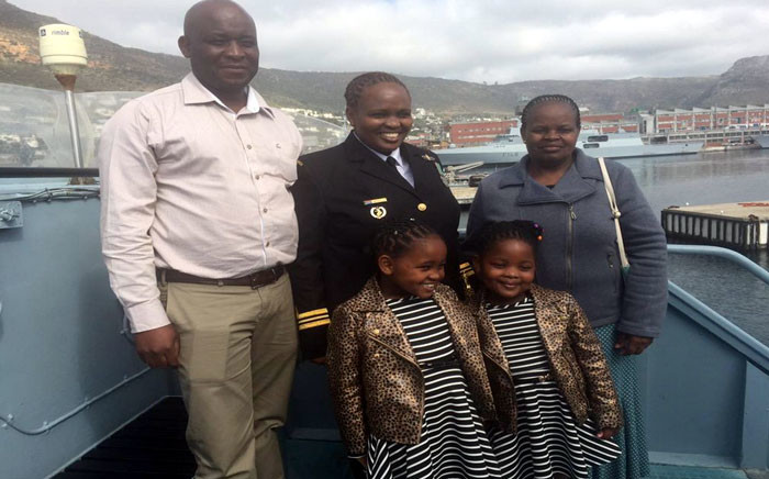 FILE: Zimasa Mabela stands with her husband, Ivan, their two children and her mother at the ceremony in Simon's Town on 26 August 2015. Picture Monique Mortlock/EWN