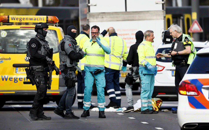 Police forces and emergency services stand at the 24 Oktoberplace in Utrecht, on March 18, 2019 where a shooting took place. Several people were wounded in a shooting on a tram in the Dutch city of Utrecht on March 18, police said, with local media reporting counter-terrorism police at the scene. Picture: AFP