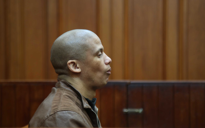 Mortimer Saunders sits in the dock as he waits for court to start. Saunders was arrested after the body of Courtney Pieters (3) was found in Epping Industria in May 2017. Picture: Bertram Malgas/EWN