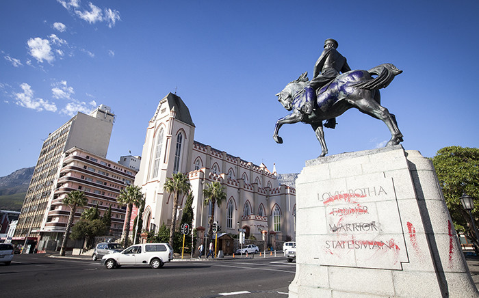 The Louis Botha statue outside of Parliament in Cape Town was defaced with red and purple paint in the early hours of 9 April. Picture: Thomas Holder/EWN