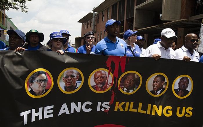 DA members march through Johannesburg streets before unveiling a new billboard on 16 January 2019. Picture: Kayleen Morgan/EWN 