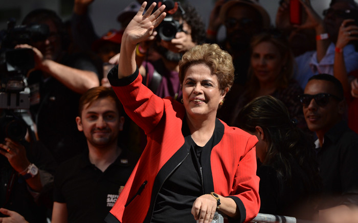 FILE: Brazilian President Dilma Rousseff waves at the crowd during a demonstration to mark International Workers’ Day, in Sao Paulo, Brazil, on 1 May, 2016. Picture: AFP.