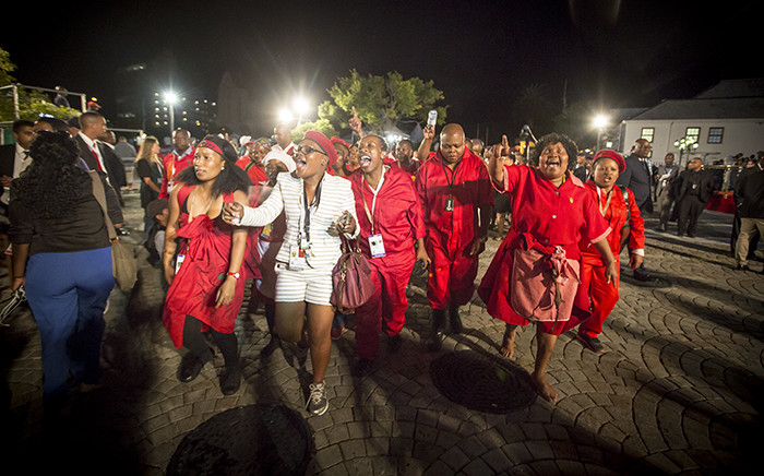After being thrown out of Parliament, EFF members sang and marched around the Parliamentary grounds. Picture: Thomas Holder/EWN