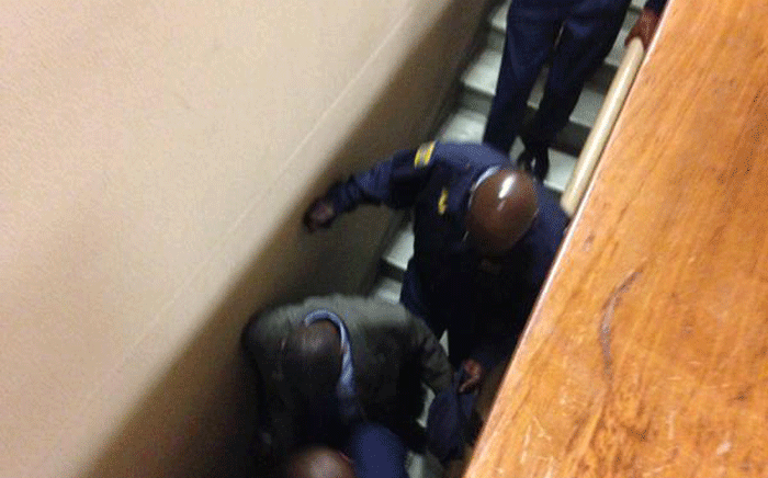 The accused are escorted into holding cells after being found guilty of the murder of Mido Macia. Picture: Masego Rahlaga/EWN.