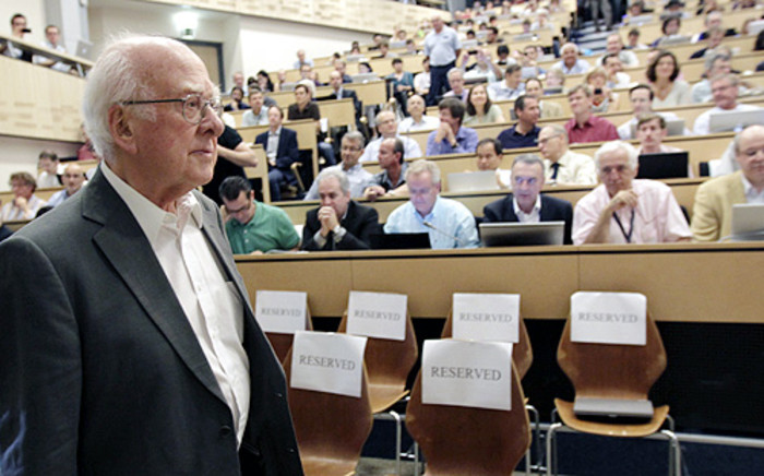 British physicist Peter Higgs arrives for the opening of a seminar to deliver the latest update in the 50-year bid to explain a riddle of fundamental matter in the search for a particle called the Higgs Boson at CERN. Picture: AFP/Pool/Denis Balibouse