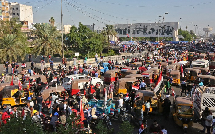 Iraqi protesters gather at Tahrir Square during ongoing anti-government demonstrations in the capital Baghdad on 1 November 2019. Picture: AFP