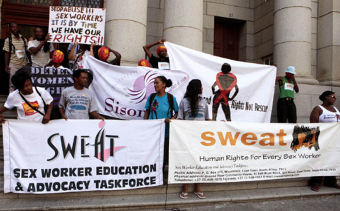 FILE: Sex workers and members of SWEAT demonstrate against alleged harassment by police outside the Cape Town High Court. Picture: Nardus Engelbrecht/SAPA