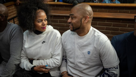 Thabo Bester and his girlfriend Nandipha Magudumana exchange whispers and held hands in the dock during court session on 8 August 2023. Picture: Katlego Jiyane/Eyewitness News 