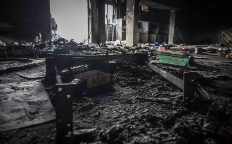 Al Barakah supermarket was ransacked and burnt inside during the 2021 July riots. Photo: Abigail Javier/Eyewitness News