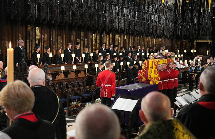The Bearer Party take the coffin of Queen Elizabeth II, from into St George's Chapel inside Windsor Castle on September 19, 2022, for the Committal Service for Britain's Queen Elizabeth II. Picture: Jonathan Brady / Pool/ AFP.