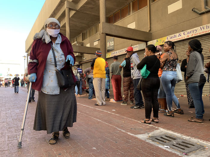 Pensioner Anne Snyman leaves Mitchells Plain's Town Centre after collecting her pension payout on 30 March 2020. She said she stood in line for six hours. Picture: Kaylynn Palm/EWN