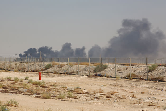 Smoke billows from an Aramco oil facility in Abqaiq about 60km (37 miles) southwest of Dhahran in Saudi Arabia's eastern province on 14 September 2019. Drone attacks sparked fires at two Saudi Aramco oil facilities, the interior ministry said, in the latest assault on the state-owned energy giant as it prepares for a much-anticipated stock listing. Picture: AFP