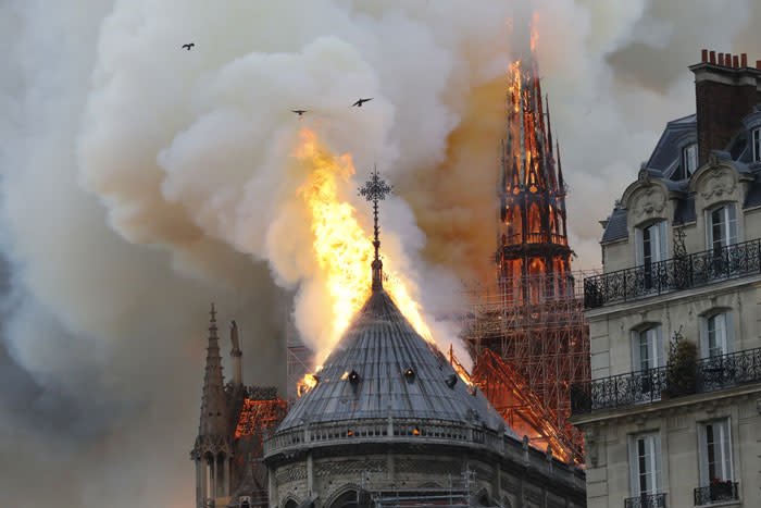 Smoke and flames rise during a fire at the landmark Notre-Dame Cathedral in central Paris on 15 April 2019. Picture: AFP