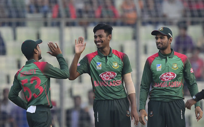 FILE: Bangladeshi cricketer Mustafizur Rahman (C) celebrates with teammates after the dismissal of the West Indies cricketer Devendra Bishoo during the first One Day International (ODI) between Bangladesh and West Indies at the Sher-e-Bangla National Cricket Stadium in Dhaka on 9 December 2018. Picture: AFP.