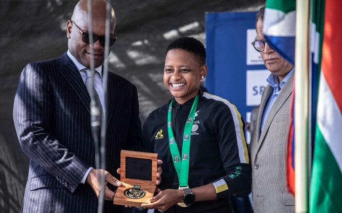 FILE: Banyana Banyana midfielder, Refiloe Jane receives gold medal from Sports, Arts and Culture Minister Nathi Mthethwa on 26 July 2022. Picture: Abigail Javier/EWN