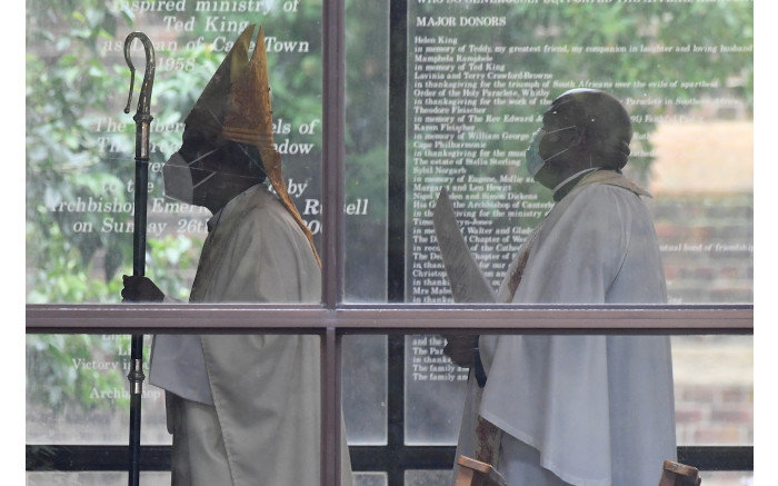 The procession is seen at the start of the requiem mass.