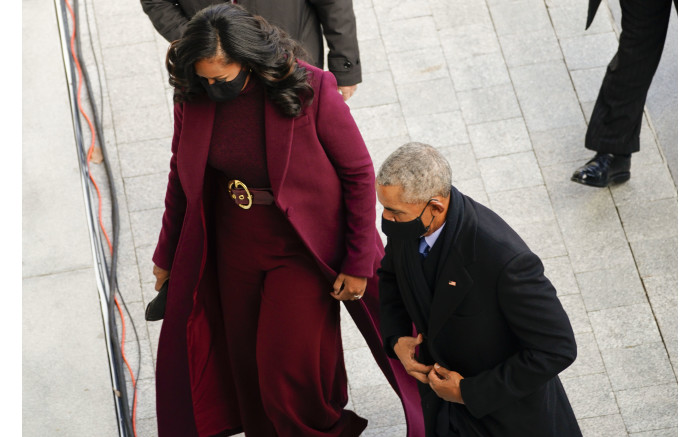 Former US President Barack Obama, and former first lady Michele Obama arrive for the inauguration of Joe Biden.