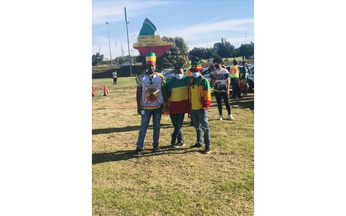 Excited fans outside the FNB Stadium for Bafana Bafana vs Ethiopia in a 2022 FIFA World Cup qualifier. Picture: Tholakele Mnganga/EWN