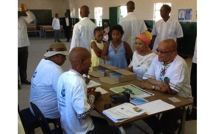 President Jacob Zuma and his wife Thobeka Madiba register to vote at the Ntolwane Primary school in Nkandla.