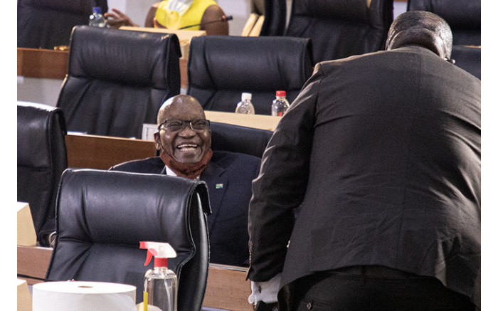 Former President Jacob Zuma is all smiles before the start of proceedings.