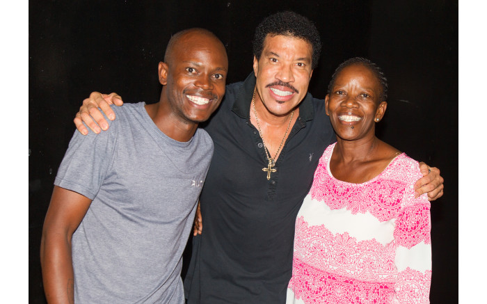 Jacob Moshokoa and his mom meets Lionel Richie.