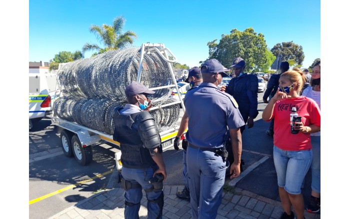 Police set up barbed wire ahead of the EFF's protest at Brackenfell High School on 20 November 2020. Picture: Zukile Daniel
