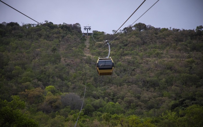 A cable-cart taking visitors to the mountain top restaurant in Euphoria Golf and Lifestyle estate.