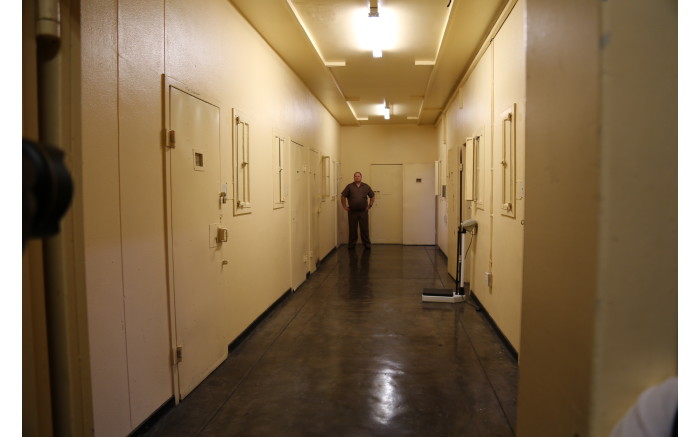 A guard stands in the hospital wing of the Kgosi Mampuru II Correctional Centre.