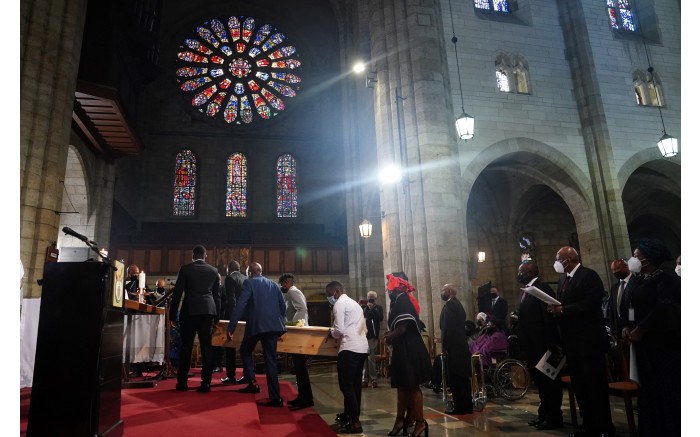 Family member carry the coffin of Archbishop Desmond Tutu.