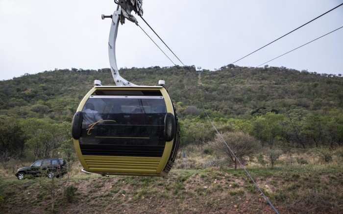 A cable-cart taking visitors to the mountain top restaurant in Euphoria Golf and Lifestyle estate.