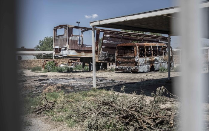 Vehicles burnt in the 2018 protests have not been removed from the centre.