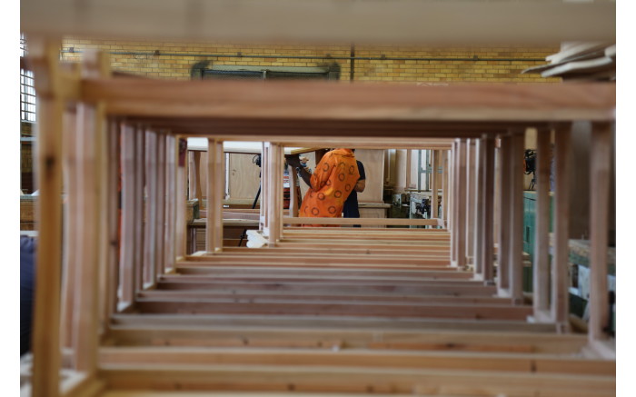 Prisoners work in the furniture workshop of the Kgosi Mampuru II Correctional Centre.