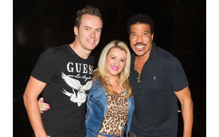 Darren Simpson and his wife meeting Lionel Richie.