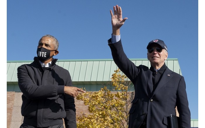 Former US President Barack Obama joins Democratic presidential candidate Joe Biden at a campaign event in Flint, Michigan, on 31 October.