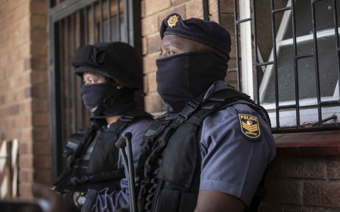 Police outside the Senekal Magistrates Court where two suspects accused of murdering Brendin Horner appeared. Picture: Abigail Javier/EWN