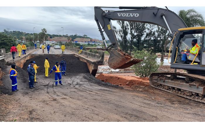 Municipal trucks seen on Saturday, 16 April beginning to repair the collapsed bridge Umlazi and Lamontville townships.