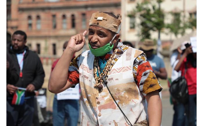 Stanley Peterson of Khoisan revolution speaking to the protesters ahead of the march.